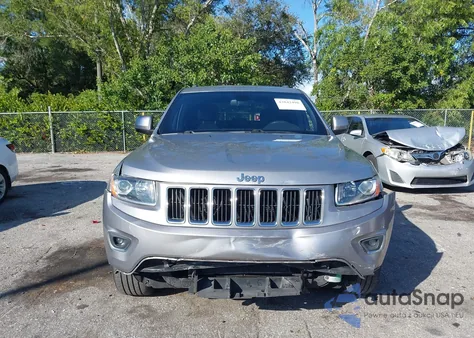 2015 Jeep Grand Cherokee Laredo z USA, uszkodzony, nr VIN 1C4RJEAG3FC721644